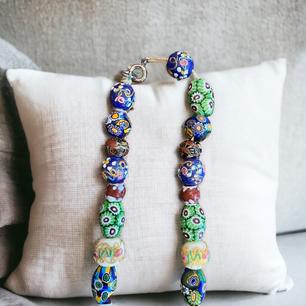 Gorgeous antique strand of vibrant beads. 35” in length. Heavy